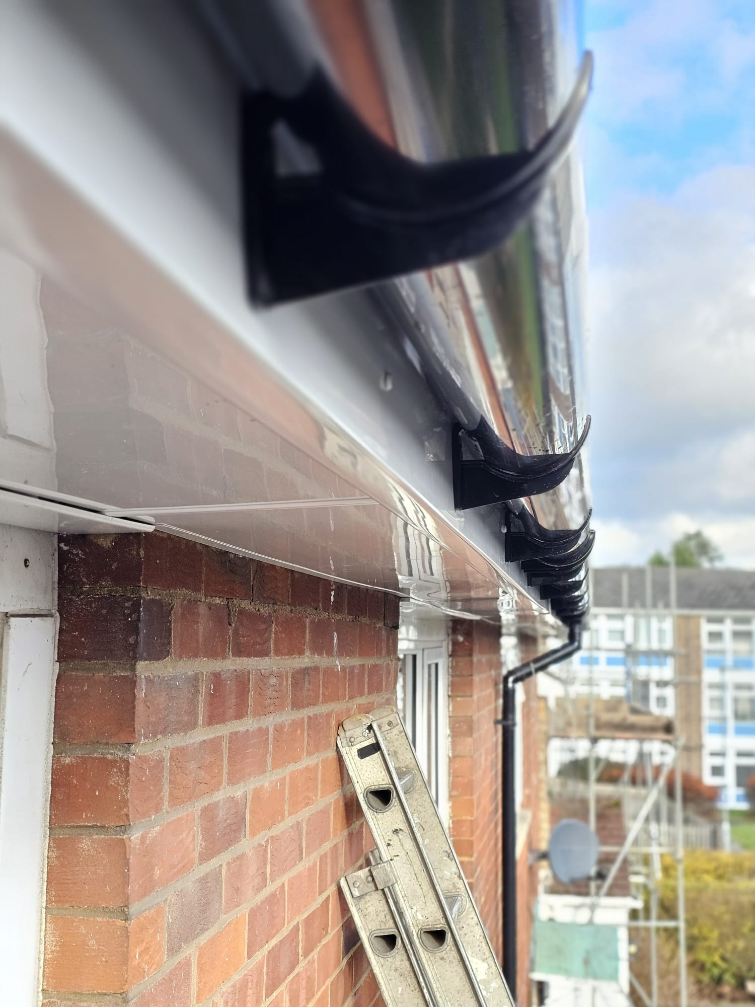 New black uPVC guttering and white fascia installed