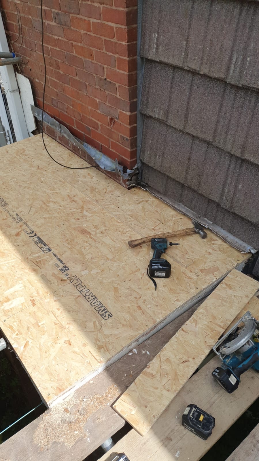 New OSB deck laid and ready for torch-on felt