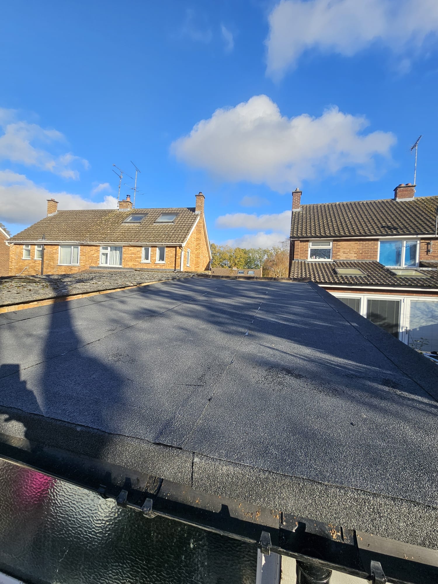 Completed torch-on felt flat roof
