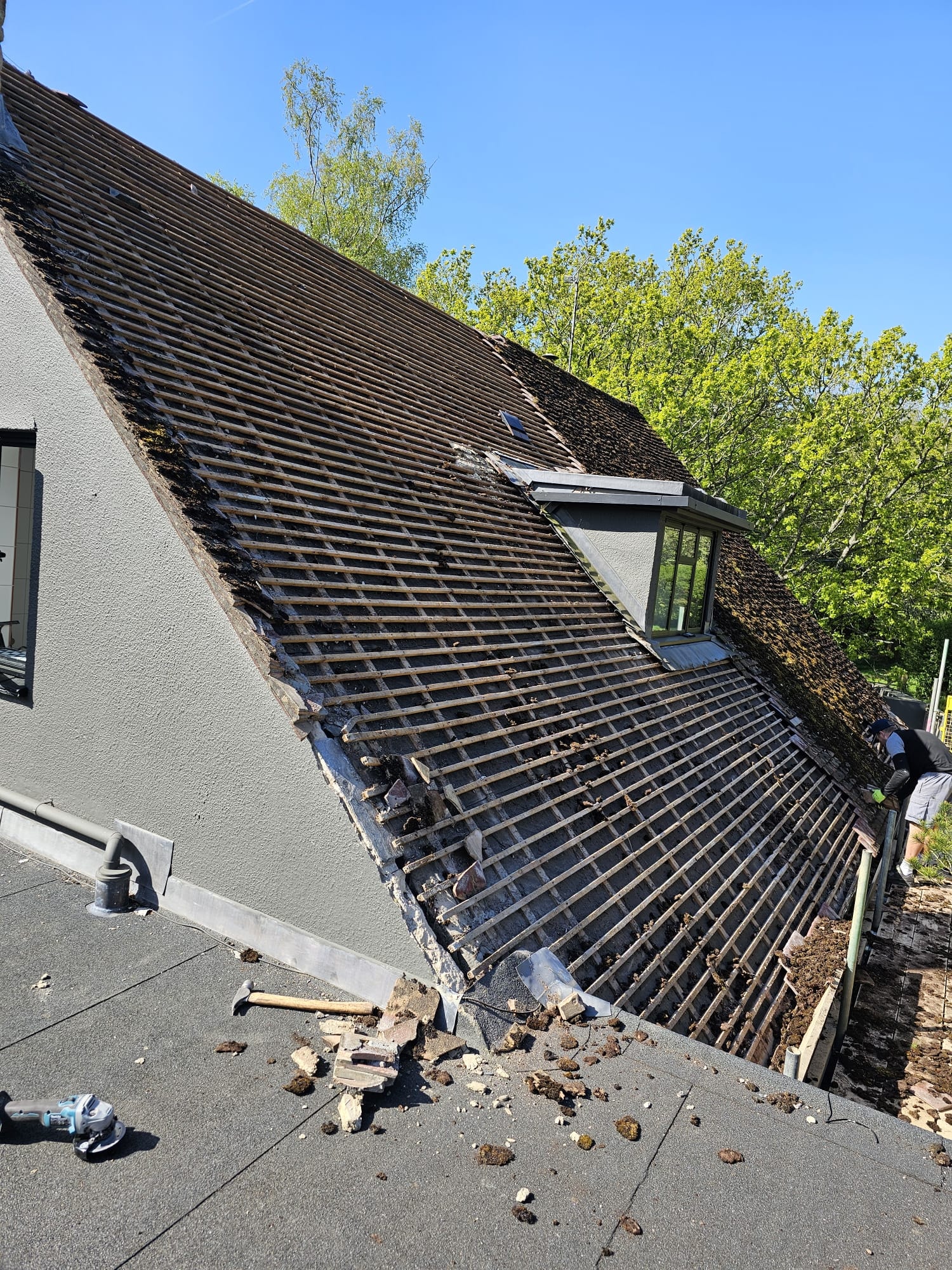 Roof Stripped to Bare Battens